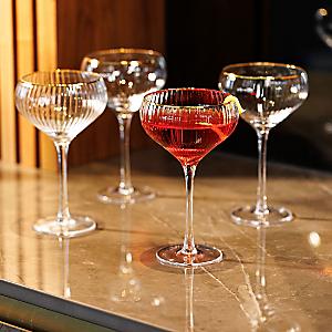 https://kaleidoscope.scene7.com/is/image/OttoUK/300w/Mikasa-Sorrento-4-Piece-Crystal-Glass-Coupe-Glass-Set~56X999FRSP.jpg