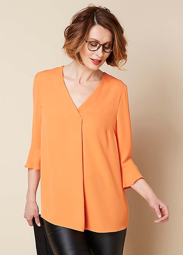 orange tunic sweater